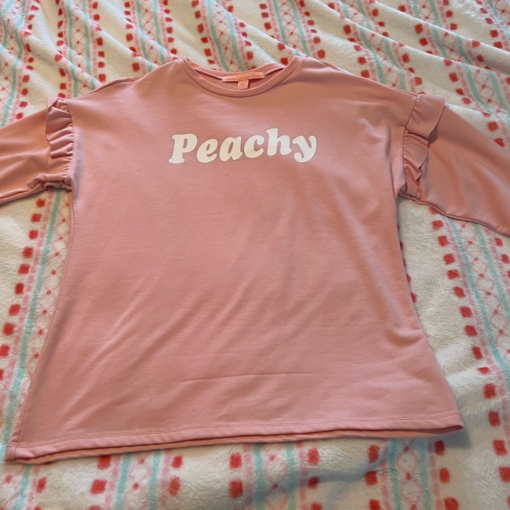 Women’s Rebellious One Peachy shirt